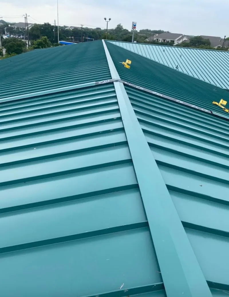 Green commercial metal roof ridge and valley for Metal Roof Repair in O'Fallon